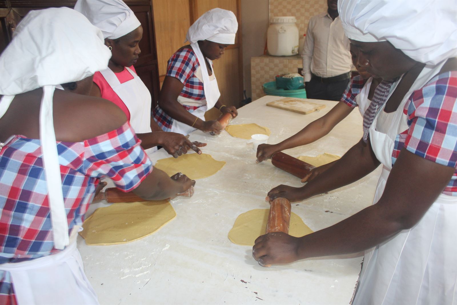Students learning through practical catering work